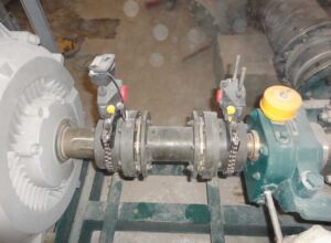 Motor Pump Shaft Alignment with Easy Laser XT770 Technician performing motor pump shaft alignment using Easy Laser XT770 laser alignment system