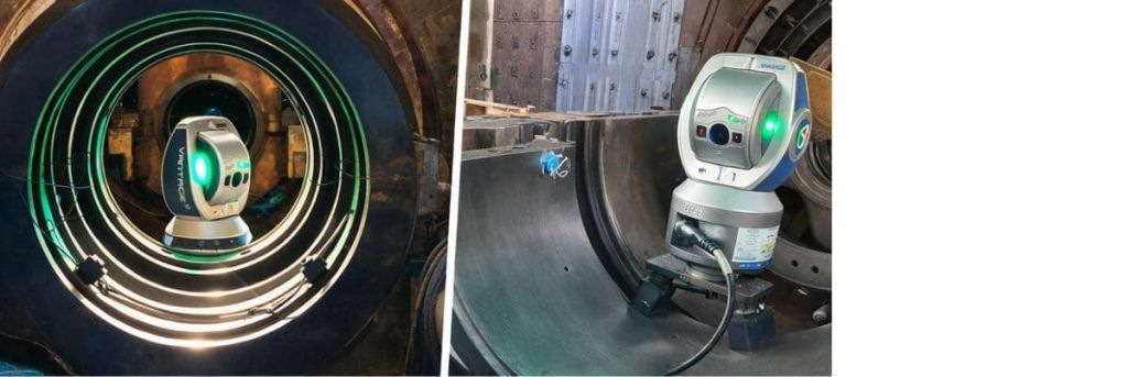 Laser Tracker Metrology System for High-Precision Industrial Measurement Laser tracker metrology system performing high-precision industrial measurement and alignment of large machinery components.